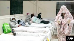 افراد مبتلا به ویروس کرونا در یکی از شفاخانه های ووهان در چین. February 5, 2020