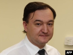 O fotografie a lui Serghei Magnițki, realizată cu trei ani înainte ca avocatul rus să moară într-o închisoare moscovită