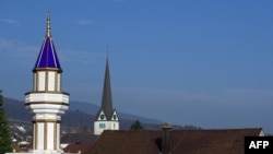 One Muslim in Moldova says that plans for building Moldova's first mosque, let alone a minaret (such as this one in Switzerland), will have to wait.
