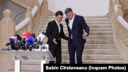 Primarul ales al Capitalei, Nicușor Dan (stânga), și premierul Marcel Ciolacu (dreapta), în vizită la Primăria Capitalei, în primul său mandat de premier, în perioada campaniei electorale când candida la funcția de președinte al României - 19 septembrie 2024