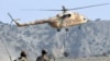 A Pakistani Army helicopter flies as soldiers patrol in Sararogha, South Waziristan (file photo).