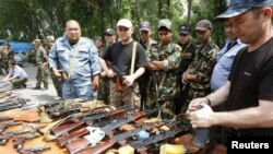 Коогалаңдан кийин чогултулган куралдар, 24-июнь, 2010-жыл, Ош шаары