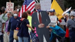 Акция протеста против ограничительных мер в связи с пандемией коронавируса, Энсинитас, Калифорния, США, 19 апреля 2020 года