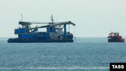 Ресейдің Новороссийск қаласындағы теңіз терминалы. Қазақстаннан Каспий құбырымен жеткізілген мұнай Қара теңіздегі осы портта танкерге тиеліп, Еуропаға жөнелтіледі.