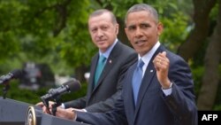 U.S. President Barack Obama and Turkish Prime Minister Recep Tayyip Erdogan conduct a joint press conference at the White House.