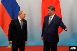Ресей президенті Владимир Путин мен Қытай басшысы Си Цзиньпин. 1 қыркүйек 2025 жыл.
