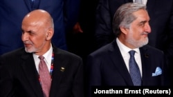 FILE: Afghan President Ashraf Ghani, left, and Afghan Chief Executive Abdullah Abdullah