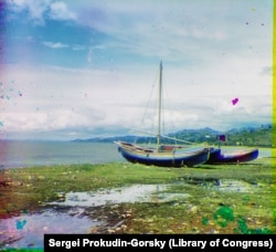 Boats sit idle along the seashore near Batumi.