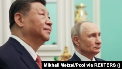 Кинескиот и рускиот претседател Си Џинпинг и Владимир Путин