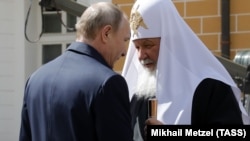 Președintele Vladimir Putin și Patriarhul Kirill justifică un eventual război nuclear. Moscova, 2017