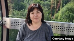 Аскер Сакыбаева.