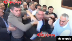 Armenia - Tigran Ter-Margarian (right), the Nor Nork district chief, and other men beat up video blogger Artur Chakhoyan, Yerevan, April 30, 2025.