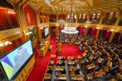 Momentul discursului președintelui ucrainean, Volodimir Zelenski, în parlamentul Norvegieidymyr Zelensky speaks via a video link to the Norwegian parliament in Oslo, Norway, 30 March 2022