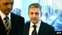 Belarus -- Russian ambassador to Ukraine Mikhail Zurabov (R) is welcomed upon his arrival for talks in Minsk, September 5, 2014