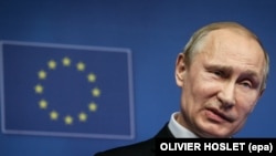 Владимир Путин на фоне символики ЕС (фото 2014 года)