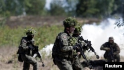 Польшанын жоокерлери Латвиядагы машыгууда. 13-июнь, 2016-жыл.