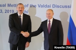 Ильхам Алиев и Владимир Путин в 2019 году
