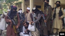 FILE: Pakistani Taliban militants in Buner, April 2009.