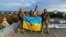 UKRAINE – Ukrainian military personnel on the roof of a building in the city of Kupyansk, Kharkiv Oblast, liberated from the army of Russia. The photo was published on September 10, 2022 