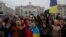 Local residents take to the streets to celebrate Russia's retreat from Kherson on November 13. 