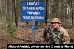 Аляксей Аўдзей падчас выкананьня баявой задачы, фота з прыватнага архіву