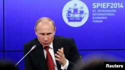 Russian President Vladimir Putin speaks at the St. Petersburg International Economic Forum on May 23. 