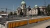 Serbia, Belgrade -- The square in front of the National Assembly in Belgrade, where for more than four months, government supporters have been blocking one of the busiest intersections in Serbia's capital.
