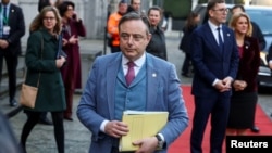 Премьер Бельгии де Вевер