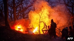 Iranian firefighters have been struggling to contain a forest fire that has been raging in Mazandaran Province for weeks. 