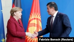 Ангела Меркел жана Сооронбай Жээнбеков. Берлин, 16-апрель, 2019-жыл.