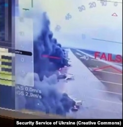 Скріншот із відео ударів СБУ по літаках стратегічної авіації Росії на аеродромі «Біла» («Бєлая», російською «Белая») в Іркутській області, що межує з Монголією. 1 червня 2025 року