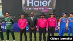 احمد شاه پکتین در جریان داوری مسابقات کرکت