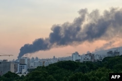 Эрон давлат телерадиоэшиттириш марказига урилган зарбадан кейин олинган тасвир.