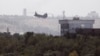 A U.S. Chinook helicopter flies near the U.S. Embassy in Kabul on August 15.