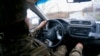 UKRAINE - NEAR POKROVSK - UKRAINIAN SOLDIER DRIVING A CAR - NOVEMBER 2025