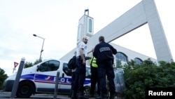 France -- Police secure a mosque in Creteil near Paris, June 29, 2017