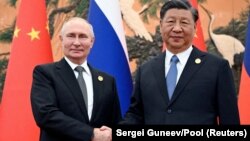 Президент РФ Владимир Путин и председатель КНР Си Цзиньпин