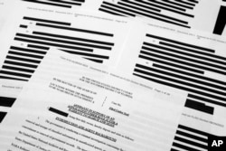 Documentul în baza căruia a fost percheziționate reședința lui Donald Trump. Acesta a fost cenzurat pentru a proteja martorii și a nu periclita desfășurarea anchetei.