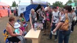 Refugiați din Ucraina trec frontiera în Rusia