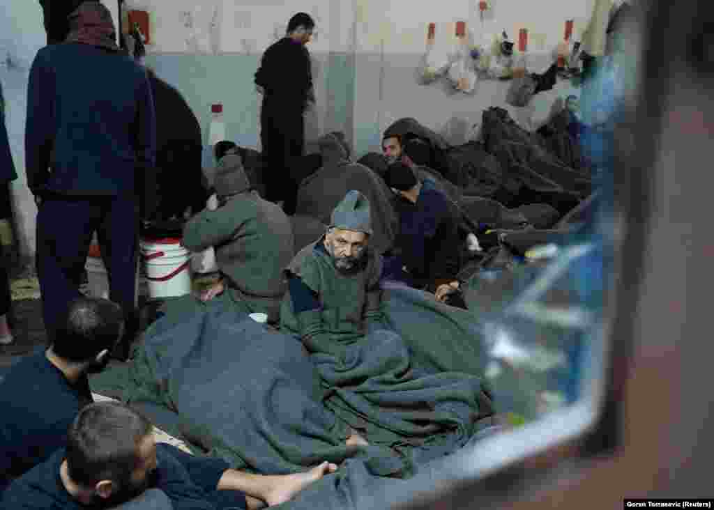 Suspects inside a prison cell in Hasaka.