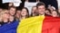 Romanian presidential candidate Nicusor Dan celebrates after exit polls showed him winning a runoff vote. Official results confirmed the victory.