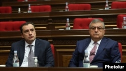 Armenia -- David Khachaturian (L) and Gagik Jahangirian attend a session of the Armenian parliament, January 22, 2021.