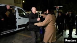 Belarusian opposition leader opposition leader Svyatlana Tsikhanouskaya welcomes Nobel laureate Ales Byalyatski in Vilnius after his release from a Belarus prison.