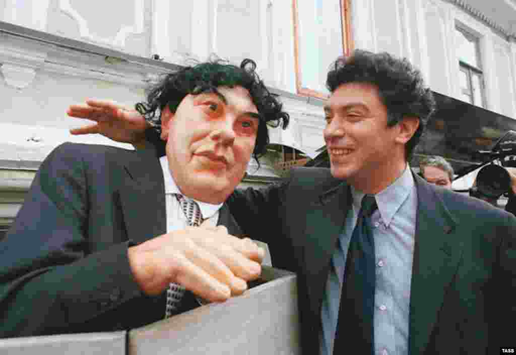 Nemtsov became leader of the Union of Right Forces party. Here he is seen with an effigy of himself from the political satire show, Puppets, in 1999.