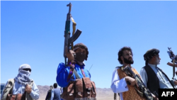 Owganystanda jeňçilere garşy ýarag alan ýerli ilat