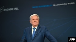  Armin Papperger, CEO al producătorului german de arme și furnizor de automobile Rheinmetall, într-o conferință de presă la care prezintă rezultatele anuale la sediul companiei din Duesseldorf, vestul Germaniei - 14 martie 2024.