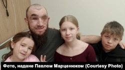 Martsenyuk says he is grateful to be able to talk to and hug his children and to tell fairytales to Anastasia, his youngest daughter.