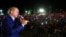 Turkish President Recep Tayyip Erdogan addresses those gathered at the Presidential Complex to protest the July 15 failed military coup attempt in Ankara, August 10.