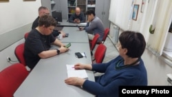 Journalists of the publication "Nasha Gazeta" in their editorial office