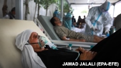 At the Afghan-Japan hospital in Kabul, where COVID-10 patients are admitted in critical condition, there is a shortage of oxygen tanks as families compete for dwindling supplies.